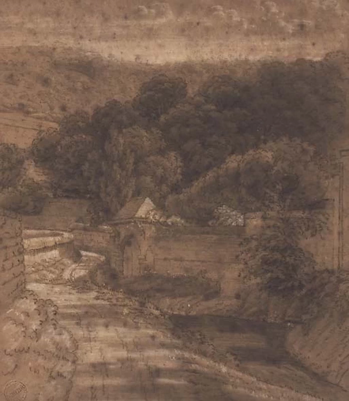 Una strada lungo le mura, un bosco dietro